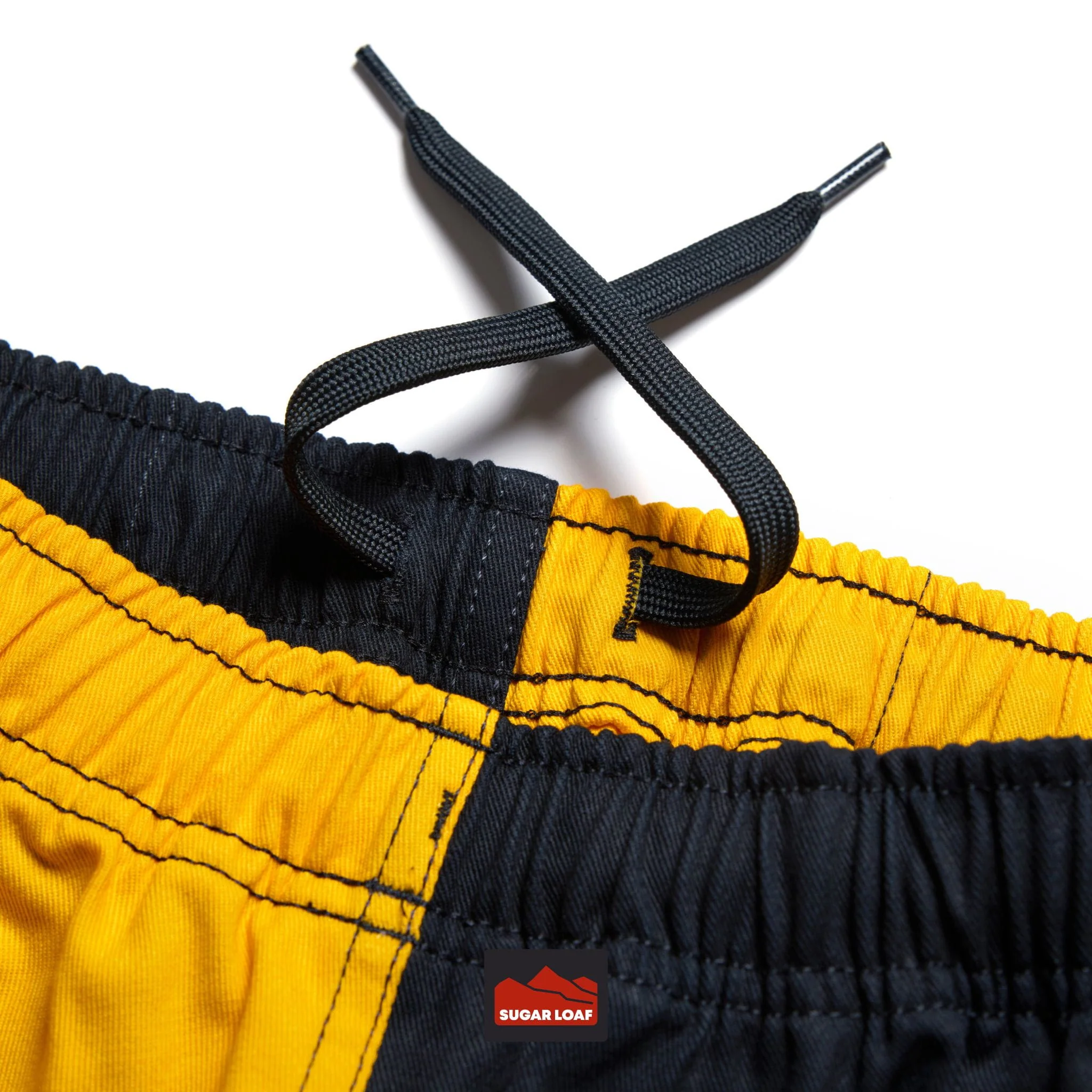 Canterbury Harlequin Shorts (Unisex) - Gold/Black - Image 3